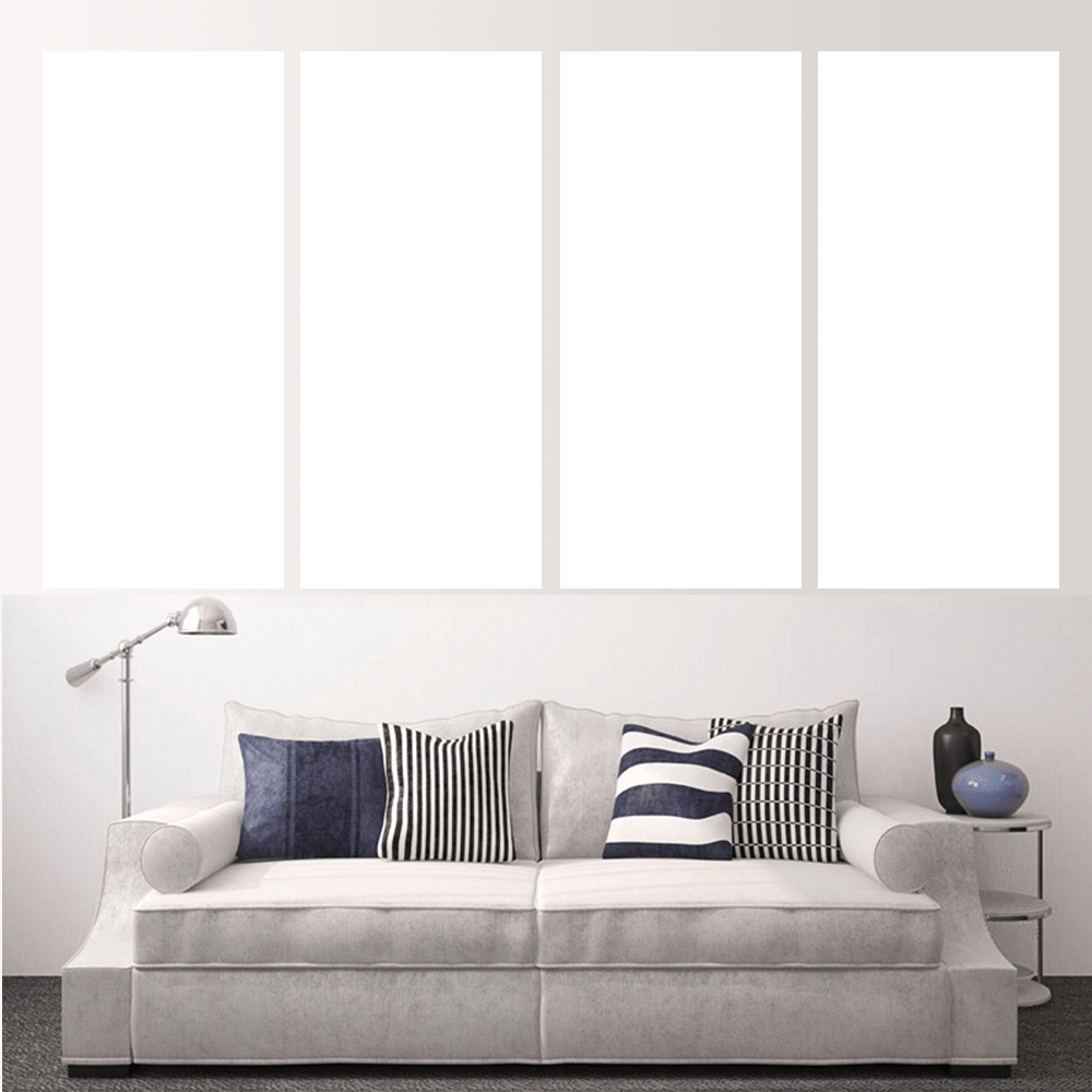 Custom split canvas prints displayed above a stylish sofa with pillows, enhancing modern home decor.