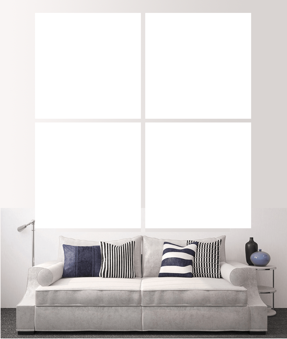 Stylish living room featuring custom split canvas prints above a modern sofa with decorative pillows.
