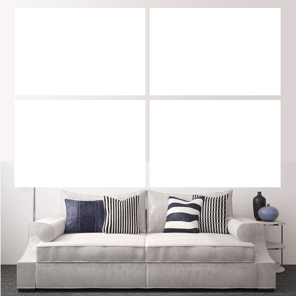 Custom split canvas prints displayed above a stylish couch with patterned pillows in a modern living room.