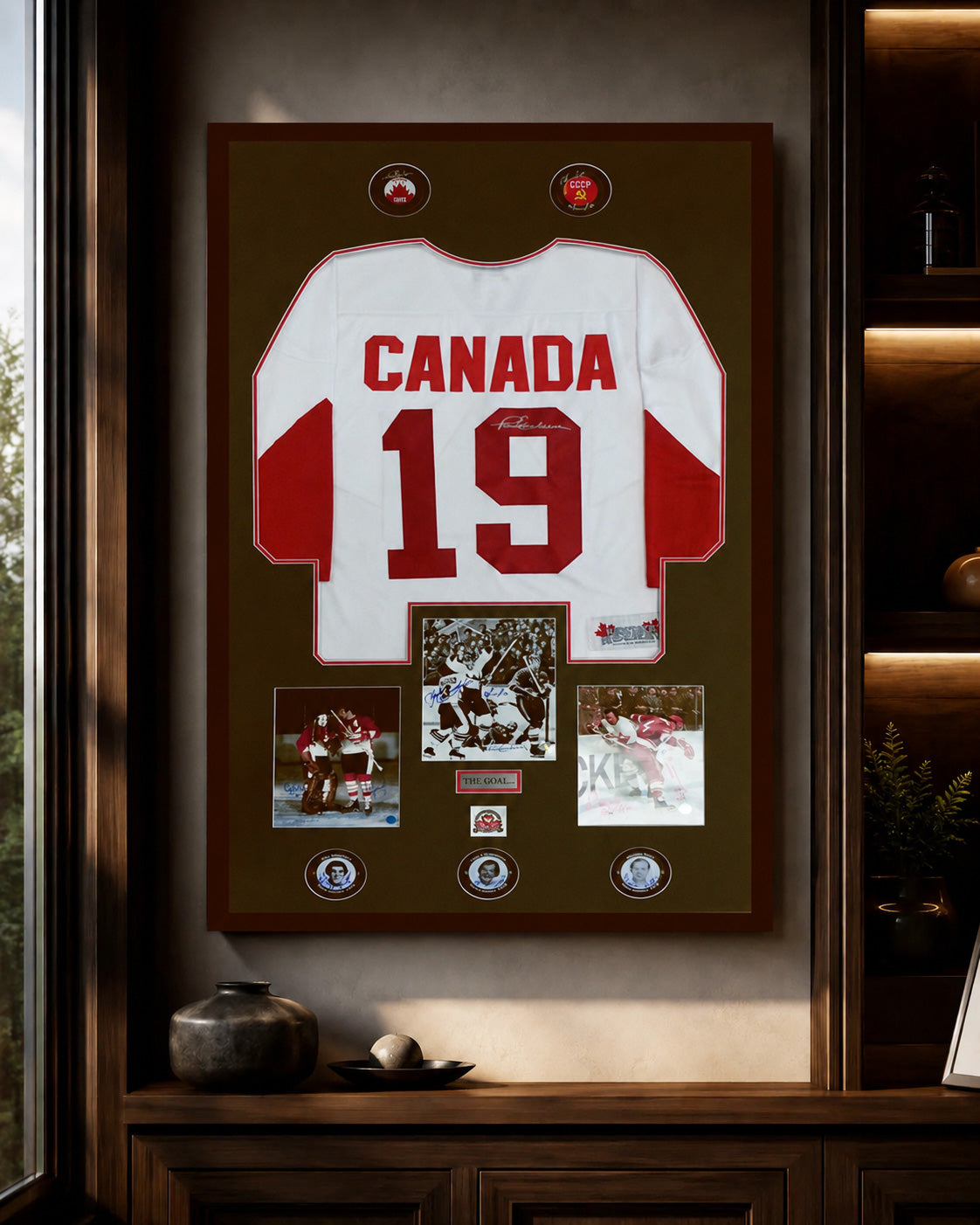 Framed hockey jersey displayed in a shadow box with sports memorabilia details.