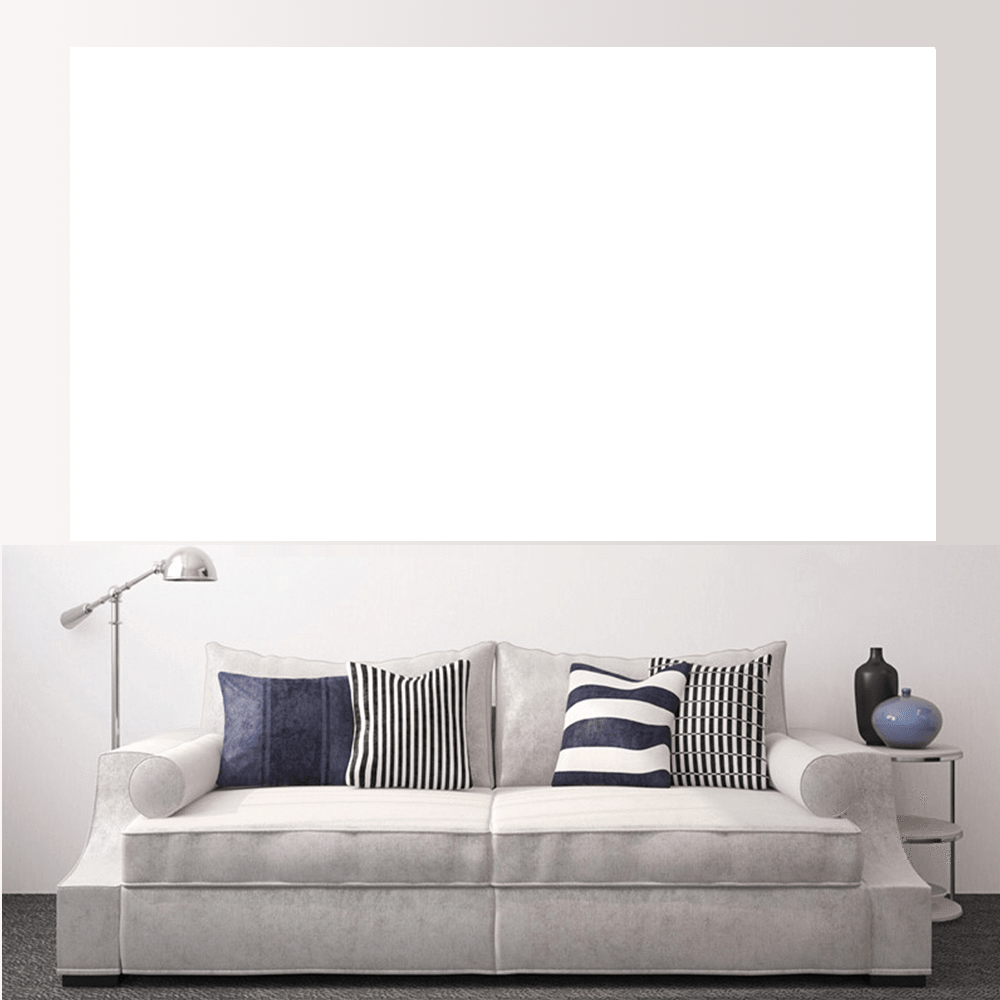 Stylish living room featuring custom split canvas prints above a modern sofa with decorative pillows.