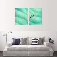 Custom split canvas prints showcasing a serene ocean wave design with a plane, perfect for stylish decor.