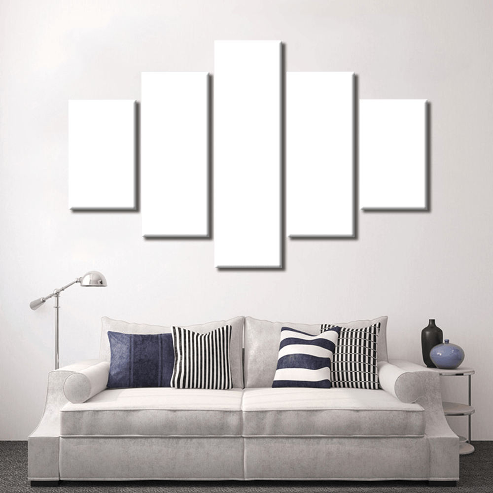 Modern living room featuring custom split canvas prints in green above a stylish sofa.