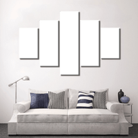 Modern living room featuring custom split canvas prints in green above a stylish sofa.
