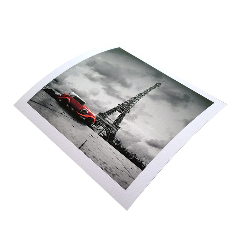 Pura Velvet fine art paper prints featuring a classic red car in front of the Eiffel Tower.